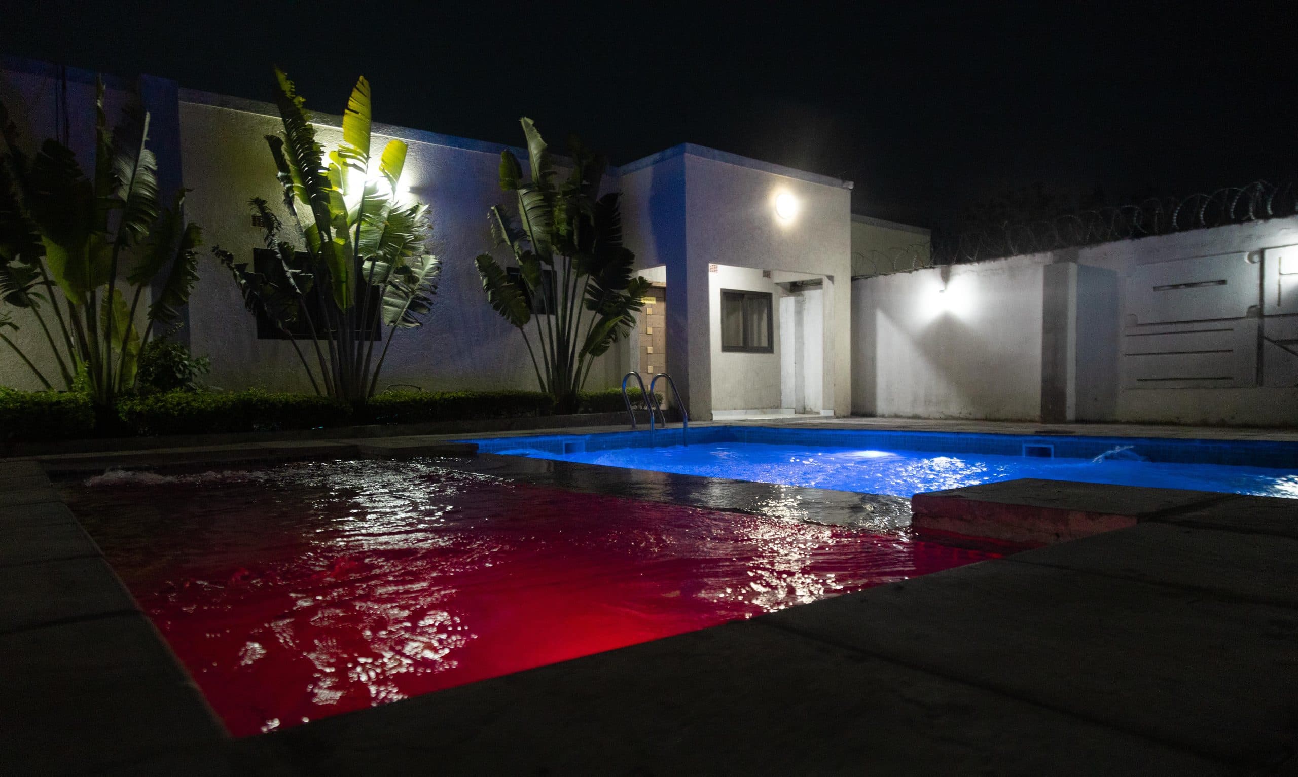 The pool, lit up after dark